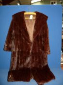 A vintage fur coat (mink??); 3/4 length sleeves, size 12/14, long length, initials 'DK' inside,