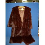 A vintage fur coat (mink??); 3/4 length sleeves, size 12/14, long length, initials 'DK' inside,