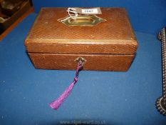 A Victorian/Edwardian leather jewellery box,