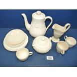 A Wedgwood Queens ware cream coloured part coffee service, date stamps for 1930's,