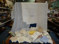 A quantity of linen including lace edged napkins and tablecloths, crocheted mats, bed sheets,