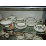 A Wedgwood 'Black Asia' dinner service comprising seven 10" plates, seven 8" plates, six 7" plates,