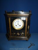 A black lacquered Mantle Clock, J.W. Benson, London, with key, 12" high, a/f.