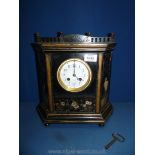 A black lacquered Mantle Clock, J.W. Benson, London, with key, 12" high, a/f.