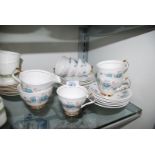 A Royal Windsor bone china tea set, 21 piece, no teapot, with blue floral decoration.