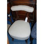 A circa 1900 Mahogany framed Nursing Chair having upholstered top rail and over-stuffed upholstered
