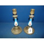 A pair of Sevres style candlesticks with gilt metal mounts, late 19th c.