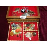A very pretty jewellery box having tray with pretty earrings and brooches etc.