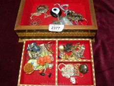 A very pretty jewellery box having tray with pretty earrings and brooches etc.