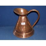 A copper ale jug