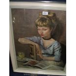 A framed Print of a young lady sitting at a table reading a book, 24'' x 28''.