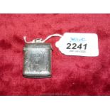 A Birmingham 1904 hallmarked silver Vesta with floral decoration and initials engraved to the front,