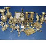 A quantity of miscellaneous brass including fire dogs, brass jugs, vases etc.