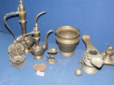 A box of Indian metal work including; ewer's, a rose bowl, oil lamps, etc.