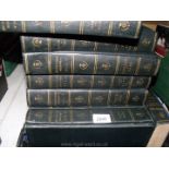 Twenty-four volumes of Encyclopedia Britannica.
