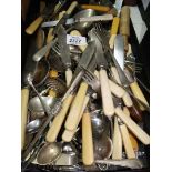 A quantity of mixed cutlery, bone handled knives, forks,