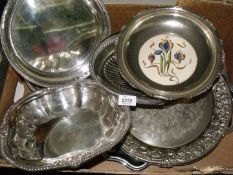 Eight plated trays and bowls including one with china base.