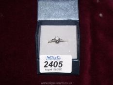 An 18 carat white gold solitaire Diamond ring set with a pale champagne coloured stone 4.