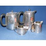 A four piece hotel style plated Teaset with black bakelite handles