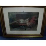 A framed and mounted Print of a reclining nude, indistinctly signed lower right.