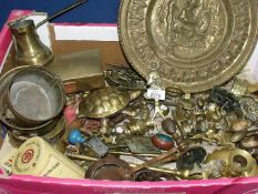 A large box of assorted brass.