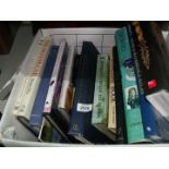 A box of books to include 'Domesday' book, Churchill, Atlas, etc.