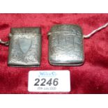 Two Birmingham silver Vestas, one marked 1896 with gilt lining, floral decoration and initials A.