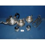 A silver plated embossed Teaset with toast rack and two egg coddlers.