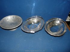 Two Victorian silver plated bread baskets with engraved decoration and swing handles.