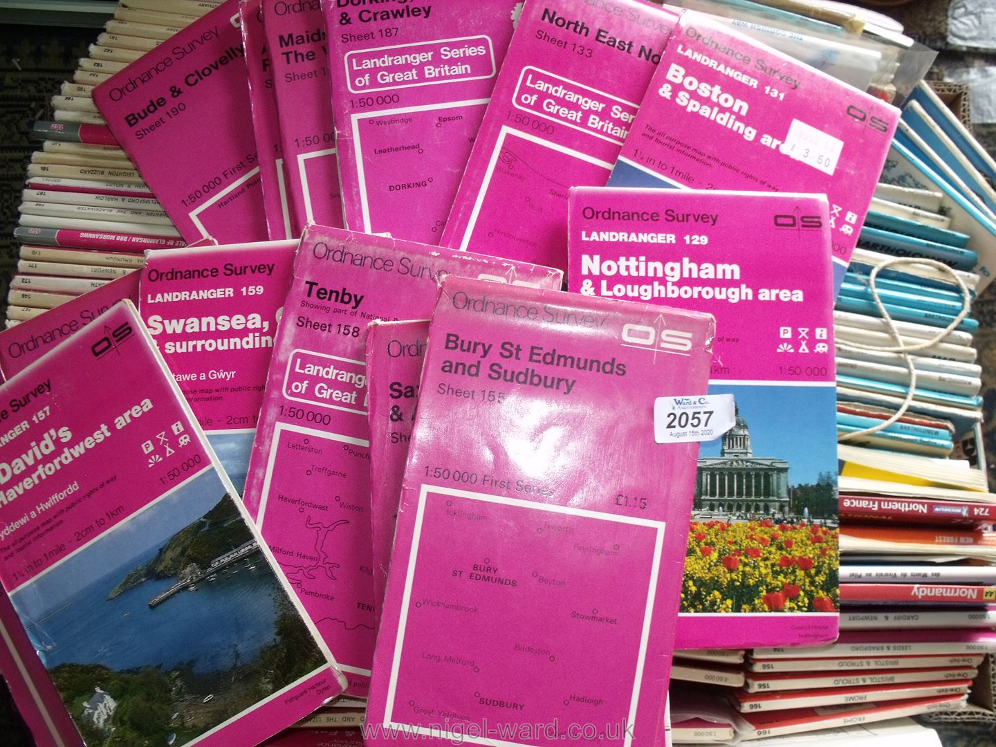 A large box of Ordnance Survey maps and others.