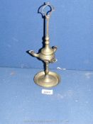 A good late George III brass four spouted whale oil Lamp, c. 1800.