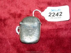 A Birmingham 1897 hallmarked silver Vesta with swirling circular decoration,