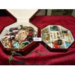 A jewellery box with a quantity of costume jewellery.