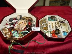 A jewellery box with a quantity of costume jewellery.
