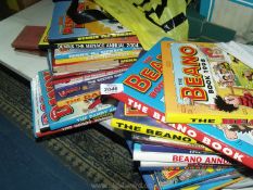 Two bags of annuals to include Beano and Dandy.