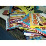 Two bags of annuals to include Beano and Dandy.