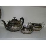 A plated teapot, sugar bowl and milk jug by H.B & H Alpha.
