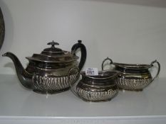 A plated teapot, sugar bowl and milk jug by H.B & H Alpha.