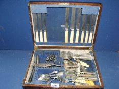 A box of miscellaneous cutlery including Madras silver part canteen, fish eaters, cake slice etc.