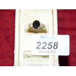 An 18ct vintage Sapphire and diamond Ring; size P , hallmarked.