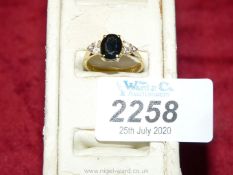 An 18ct vintage Sapphire and diamond Ring; size P , hallmarked.