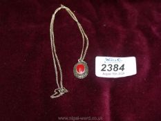 A very pretty silver necklace with red stone to centre marked 925.