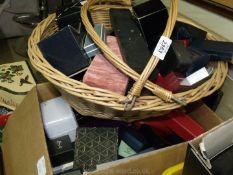 A box of jewellery boxes together with a basket of jewellery boxes.