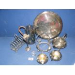 A three piece silver plated Teaset, circular tray, toast rack, etc.