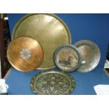 Five brass, copper and metal trays.