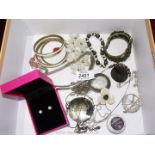 A small quantity of costume jewellery to include; bangles, necklaces, earrings, etc.
