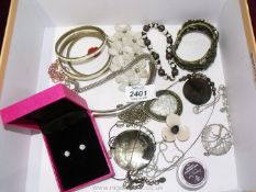 A small quantity of costume jewellery to include; bangles, necklaces, earrings, etc.