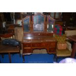 Dressing table with bevelled edge triptych mirror with glass protective top standing on ball and
