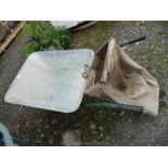 Metal wheelbarrow and a hand mower grass collection box