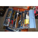 A cantilever metal tool box and contents.